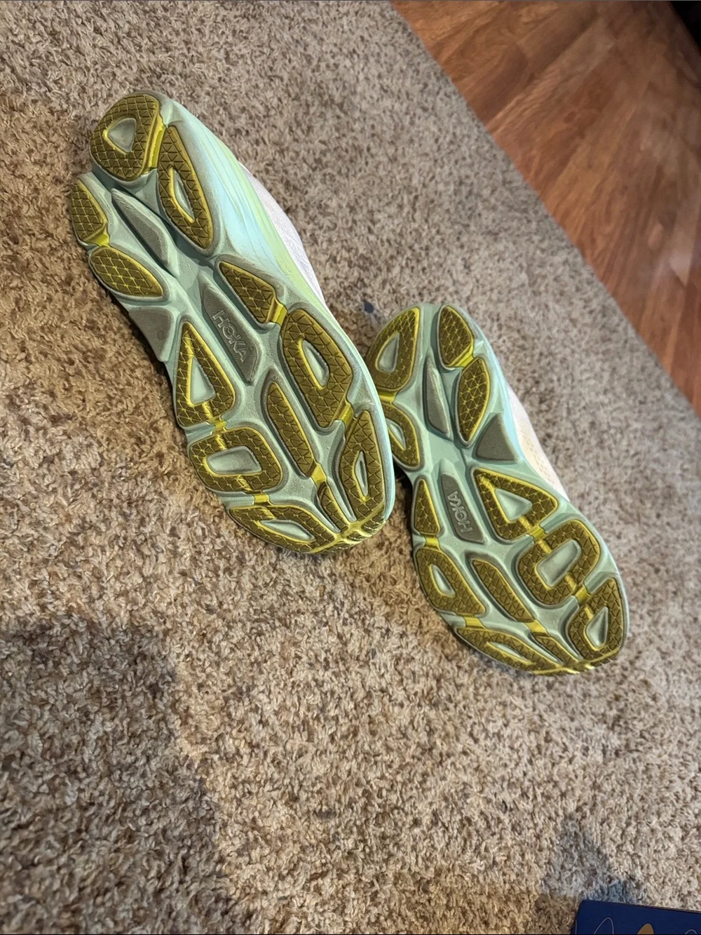 Hoka Bondi 8 White Sneakers with Mint Green Soles and Yellow Accents
